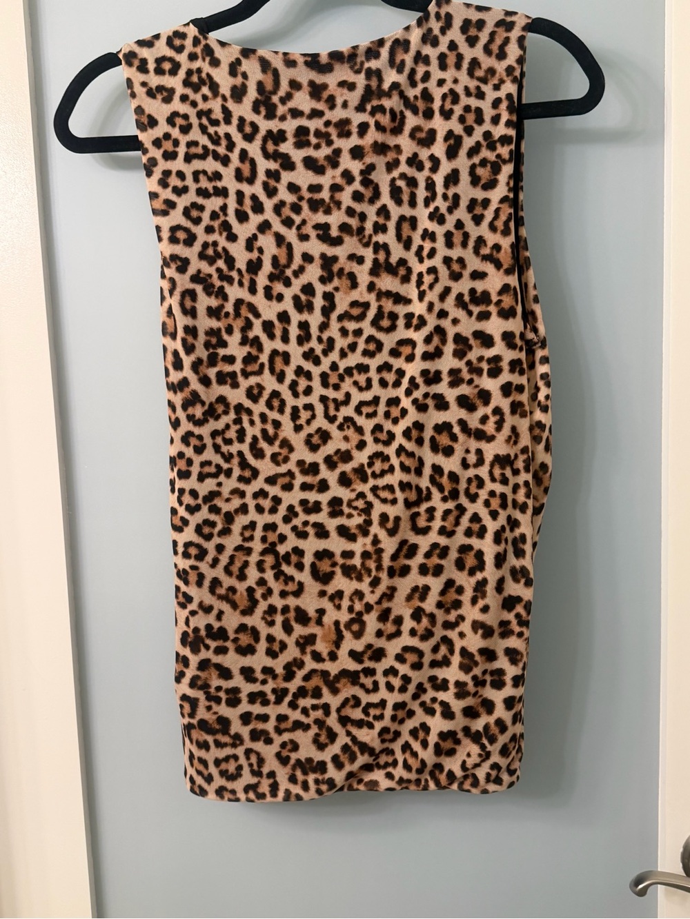 INC International Concepts Leopard top. Stretchy material, low v-neck